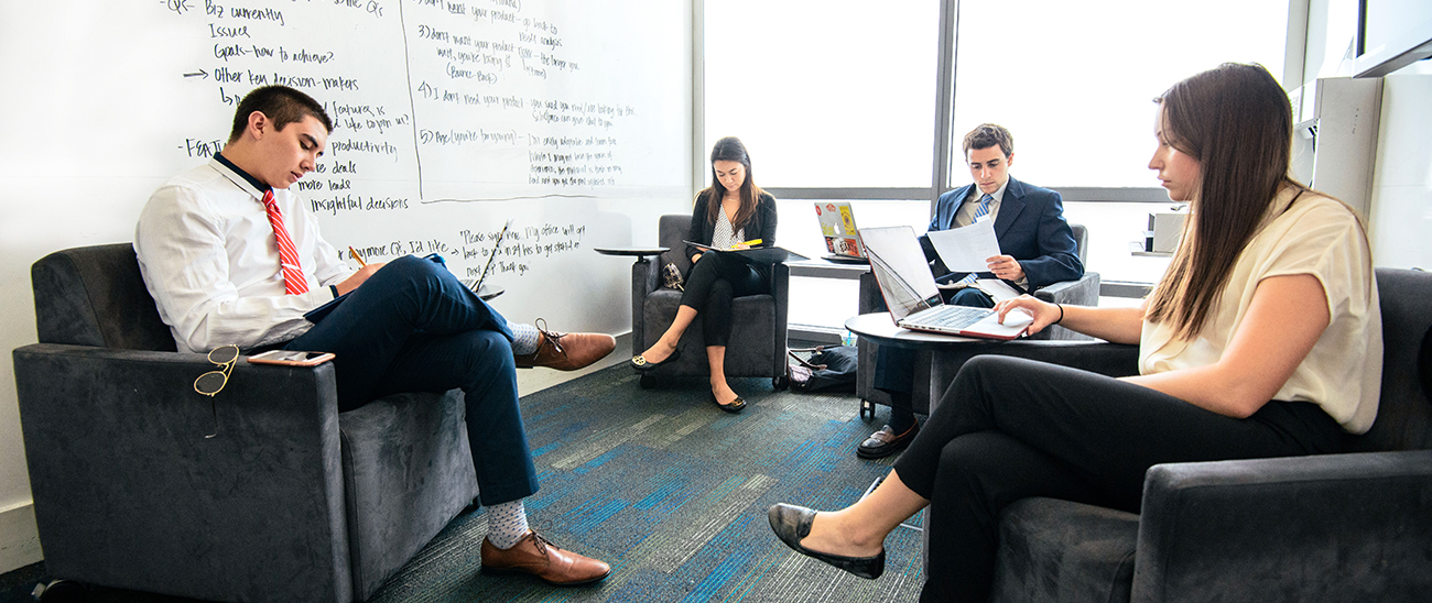 Students using a group study room.