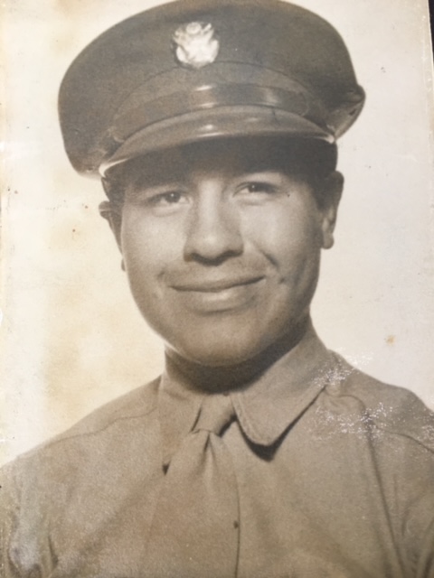 A portrait of Henry De La Riva Rivas in his United States Army uniform. On the back of the photo Henry wrote: 
