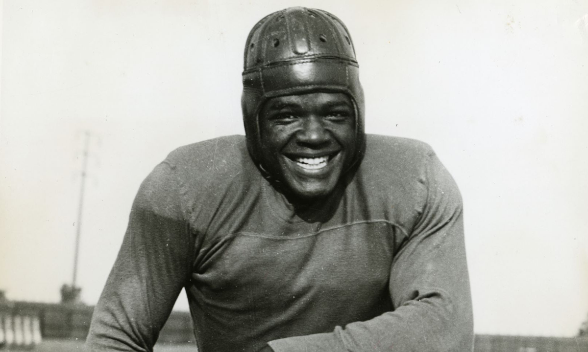 Black and white photo of football player