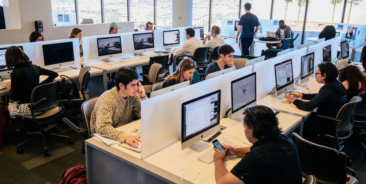 students in information commons using computers