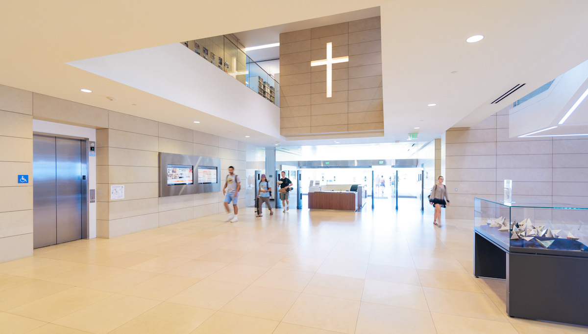 cross on wall in library interior